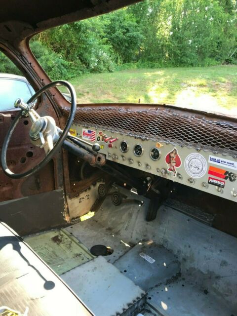 1941 Rust Ford Deluxe Coupe