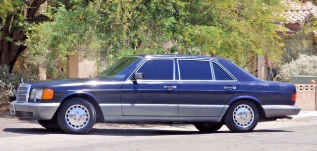 1986 Blue Mercedes-Benz 400-Series Sedan