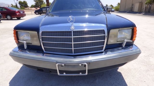 1986 Blue Mercedes-Benz 400-Series Sedan
