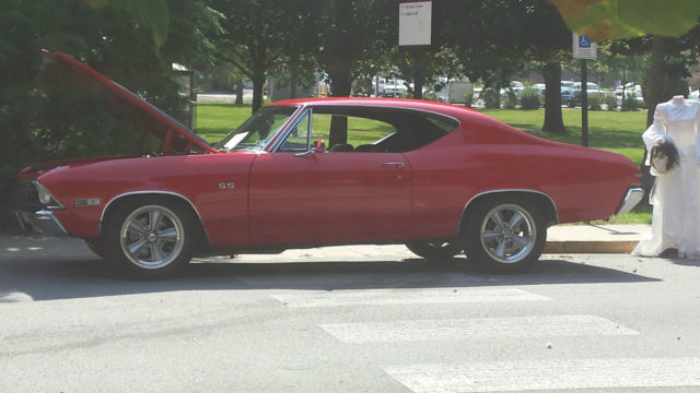 1968 Red with black stripes Chevrolet Chevelle Coupe