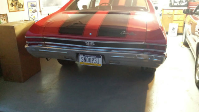 1968 Red with black stripes Chevrolet Chevelle Coupe