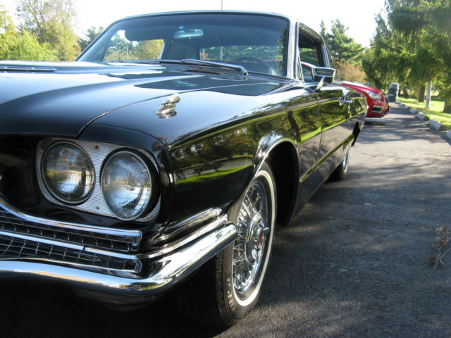 1966 Black Ford Thunderbird Landau