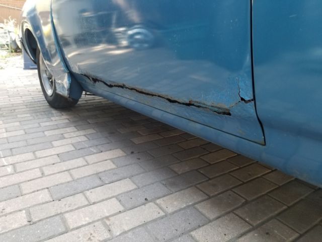 1968 blue Oldsmobile Cutlass Convertible