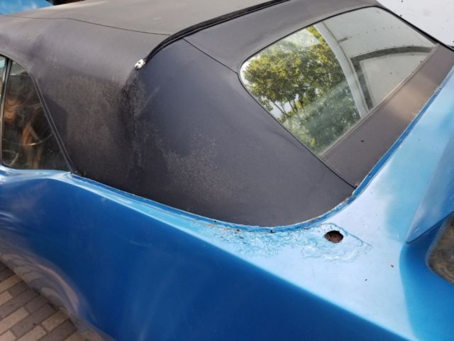 1968 blue Oldsmobile Cutlass Convertible