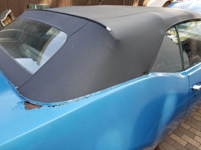 1968 blue Oldsmobile Cutlass Convertible