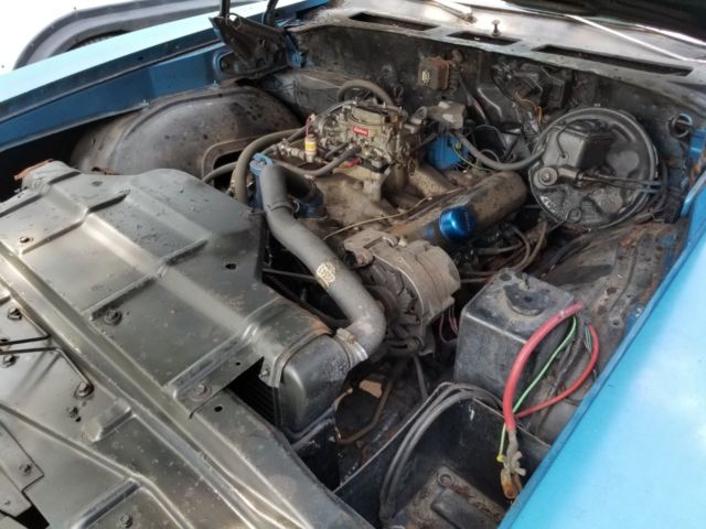 1968 blue Oldsmobile Cutlass Convertible