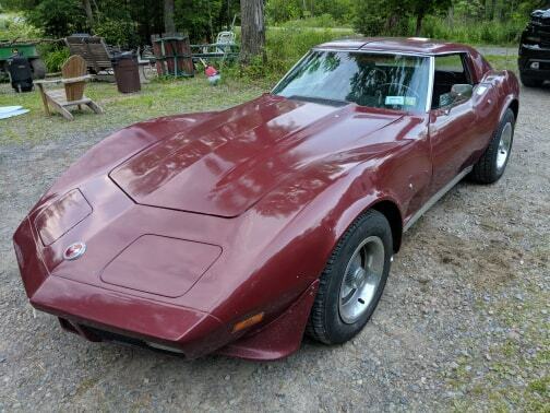 1974 maroon Chevrolet Corvette Coupe
