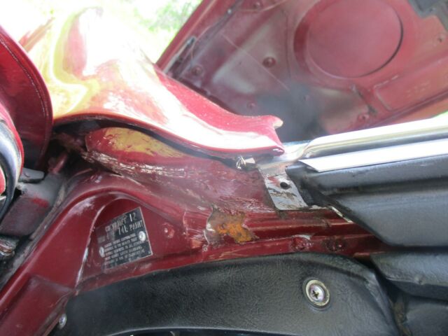 1974 maroon Chevrolet Corvette Coupe