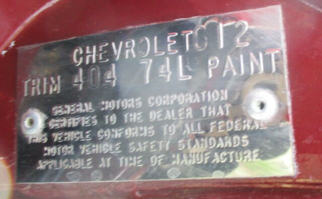 1974 maroon Chevrolet Corvette Coupe