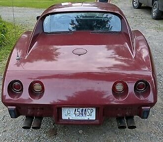 1974 maroon Chevrolet Corvette Coupe