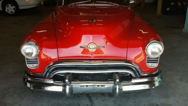 1949 Red Oldsmobile Eighty-Eight Convertible