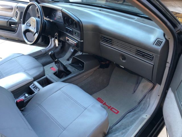 1989 Black Ford Taurus Coupe