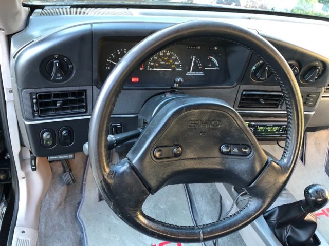 1989 Black Ford Taurus Coupe