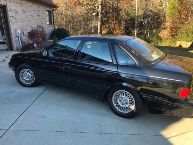 1989 Black Ford Taurus Coupe