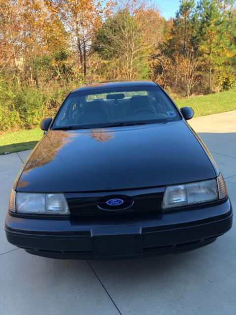 1989 Black Ford Taurus Coupe