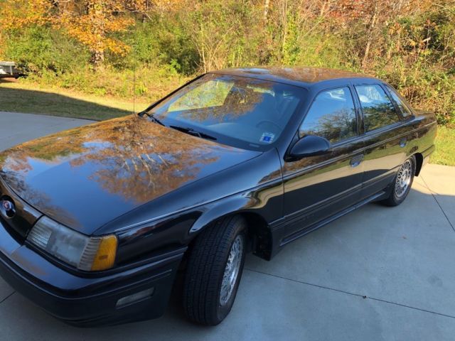 1989 Black Ford Taurus Coupe