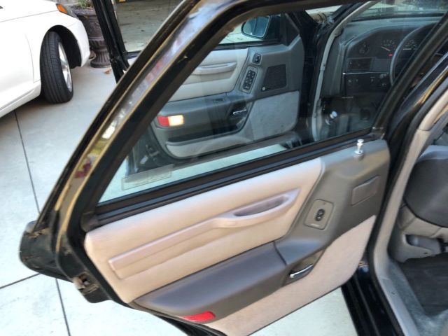 1989 Black Ford Taurus Coupe