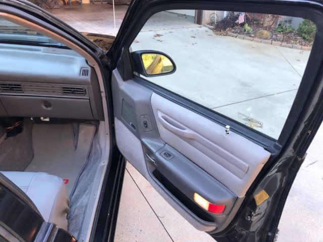 1989 Black Ford Taurus Coupe