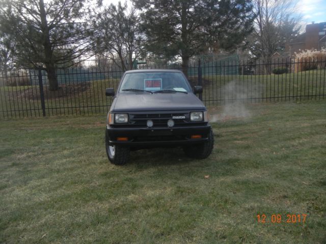 1990 Blue Toyota Tacoma Extended Cab Pickup