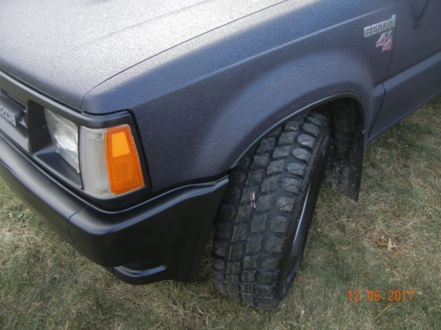 1990 Blue Toyota Tacoma Extended Cab Pickup