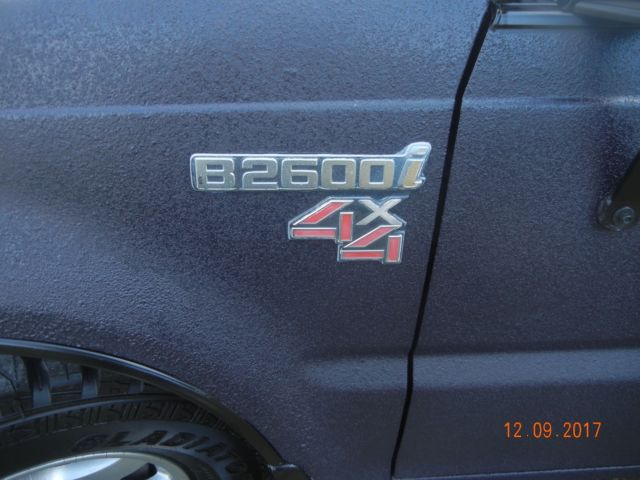 1990 Blue Toyota Tacoma Extended Cab Pickup