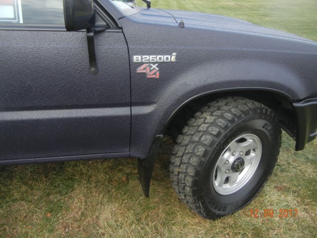1990 Blue Toyota Tacoma Extended Cab Pickup