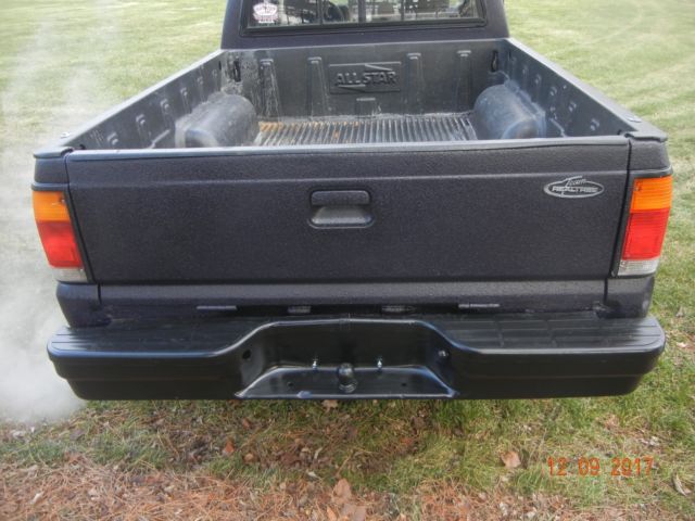 1990 Blue Toyota Tacoma Extended Cab Pickup