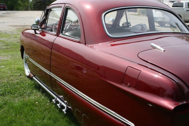 1950 Burgundy Ford Deluxe Coupe