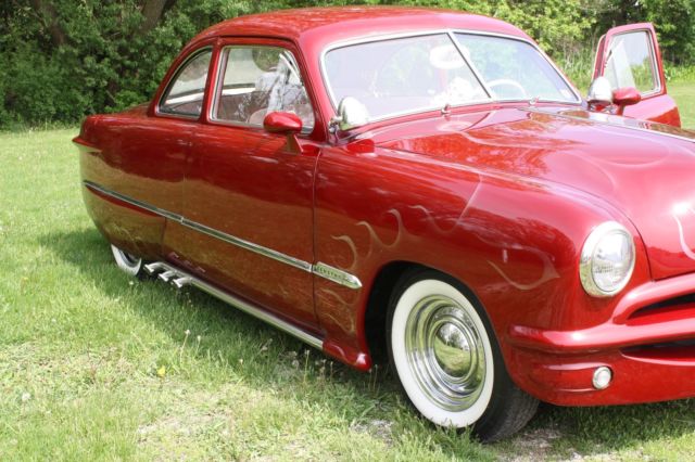 1950 Burgundy Ford Deluxe Coupe