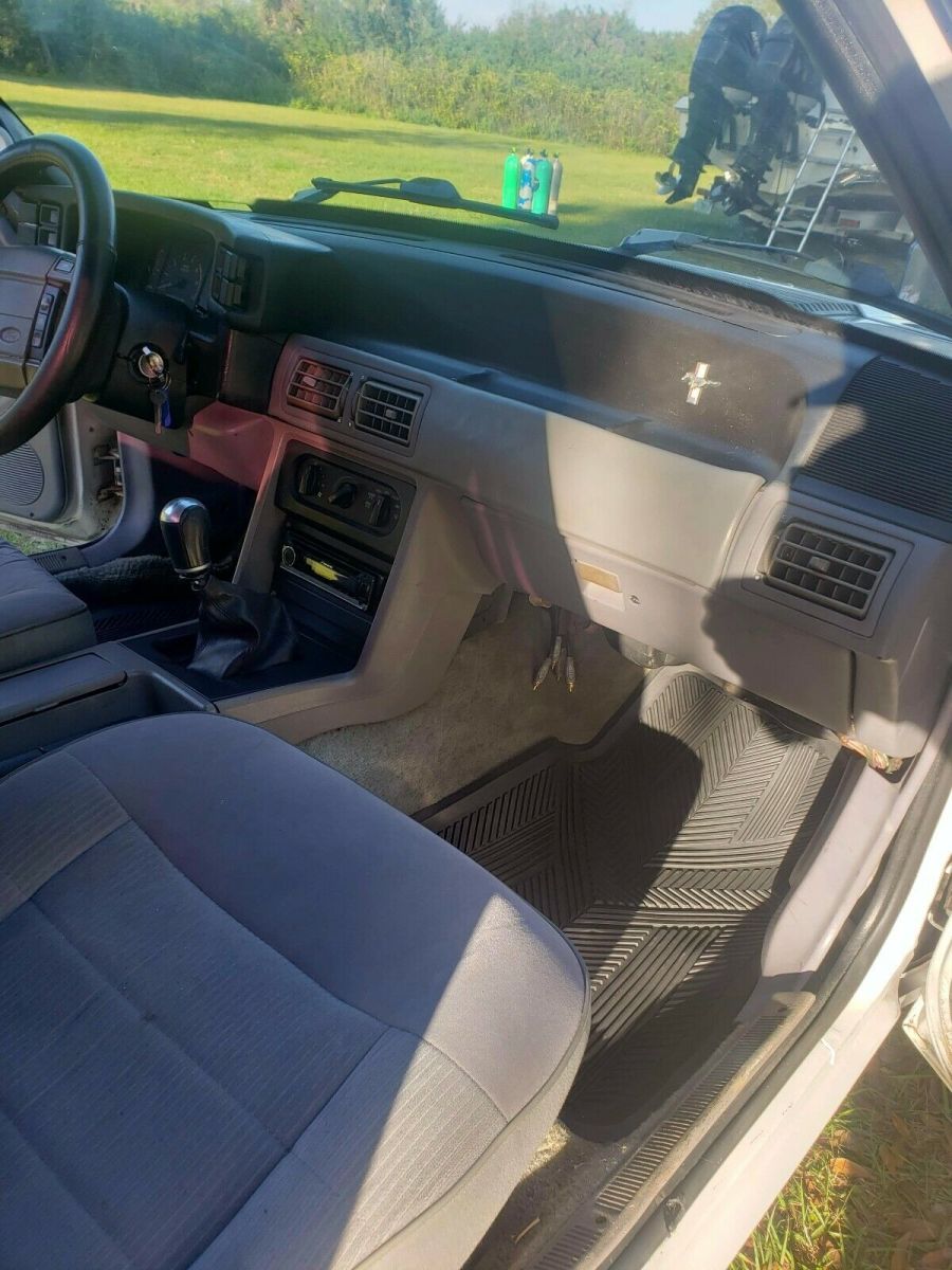 1990 White Ford Mustang Sedan