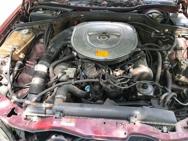 1985 Red Mercedes-Benz 500-Series Coupe