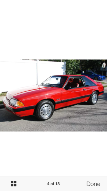 1989 Red Ford Mustang Hatch back