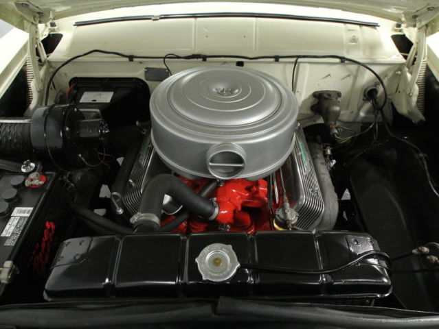 1956 Red Ford Fairlane Coupe