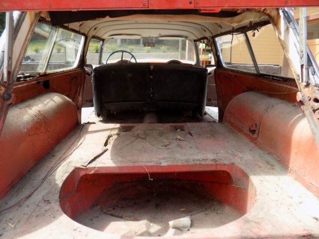 1955 flat black Chevrolet Nomad Wagon