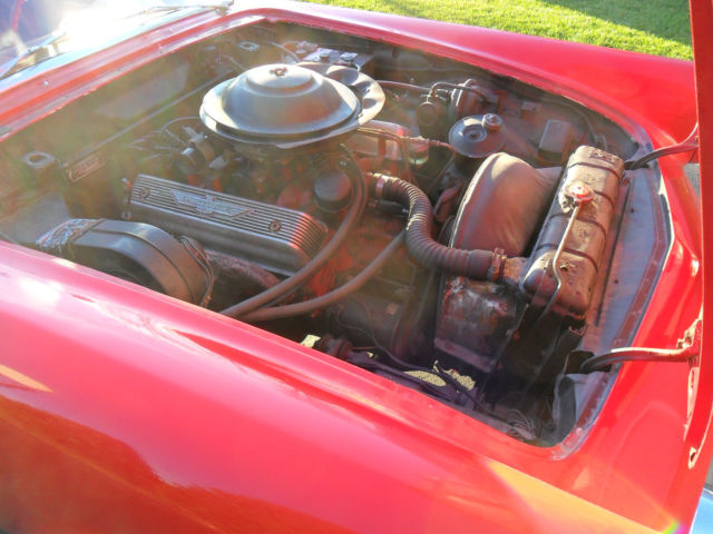 1955 golden rod yellow Ford Thunderbird Convertible