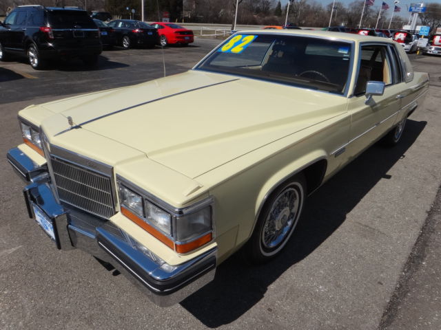 1982 Yellow Cadillac DeVille Sedan