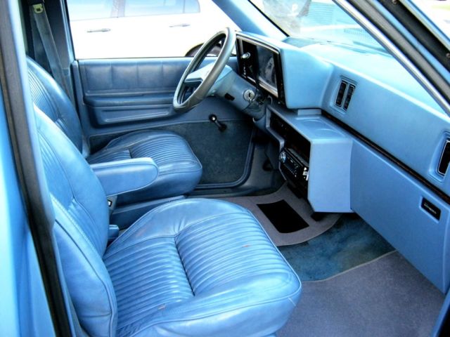 1984 Blue Dodge Caravan Minivan