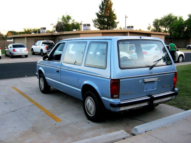 1984 Blue Dodge Caravan Minivan