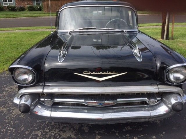 1957 Black Chevrolet Bel Air/150/210 4 door sedan
