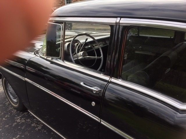 1957 Black Chevrolet Bel Air/150/210 4 door sedan
