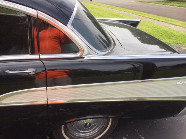 1957 Black Chevrolet Bel Air/150/210 4 door sedan