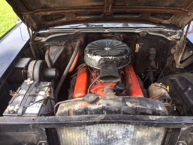 1957 Black Chevrolet Bel Air/150/210 4 door sedan