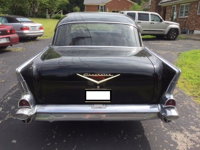1957 Black Chevrolet Bel Air/150/210 4 door sedan