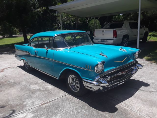 1957 turquoise Chevrolet Bel Air/150/210 2 Dr HT
