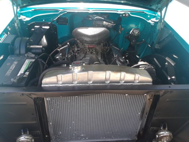 1957 turquoise Chevrolet Bel Air/150/210 2 Dr HT