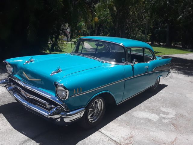 1957 turquoise Chevrolet Bel Air/150/210 2 Dr HT
