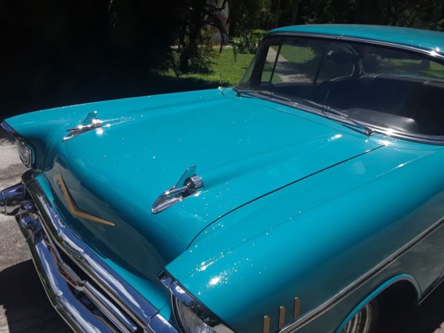 1957 turquoise Chevrolet Bel Air/150/210 2 Dr HT