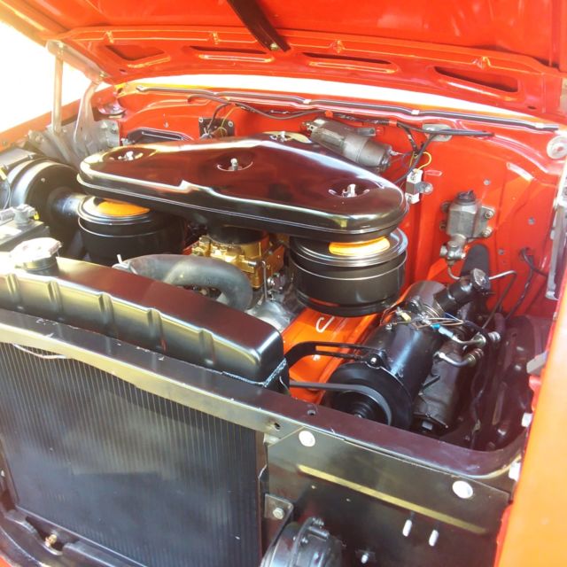 1957 Red Chevrolet Bel Air/150/210 Sedan