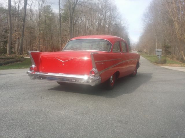 1957 Red Chevrolet Bel Air/150/210 Sedan