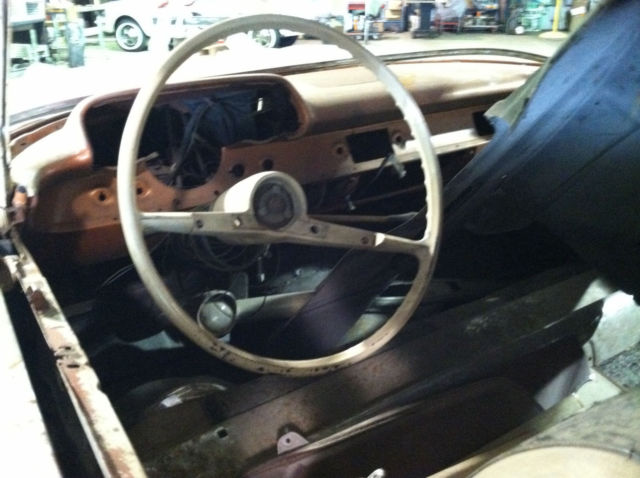 1957 Red Chevrolet Bel Air/150/210 Sedan
